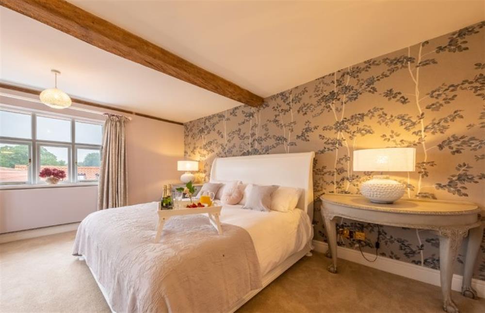 Generous bedroom one (Purnell) with a 6’ super-king size bed (photo 2) at The Farmhouse, Nether Hall Estate, Pakenham