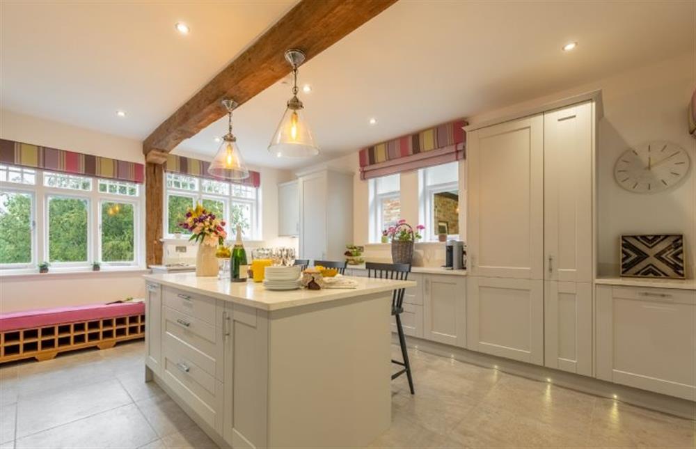 Kitchen with bespoke wine rack at The Farmhouse, Nether Hall Estate, Pakenham