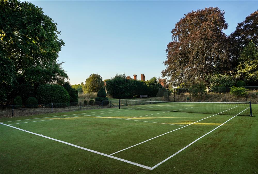 The all weather tennis court at The Farmhouse,  Nether Hall Estate, Pakenham