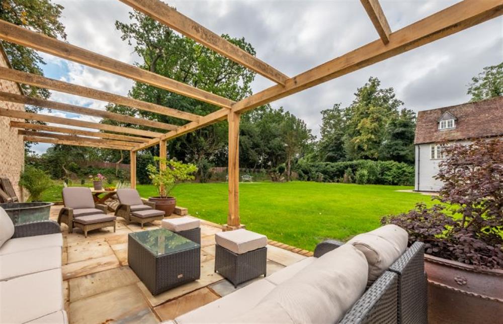 The Vinehouse pergola with patio at The Farmhouse, Nether Hall Estate, Pakenham