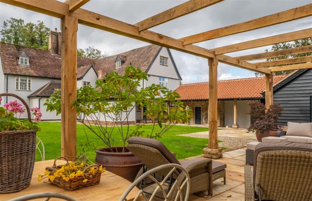 The Vinehouse with views of the main farmhouse at The Farmhouse, Nether Hall Estate, Pakenham