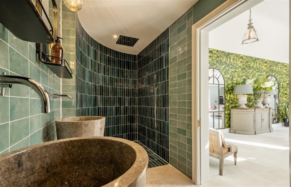 Wet room with large, curved shower at The Farmhouse, Nether Hall Estate, Pakenham