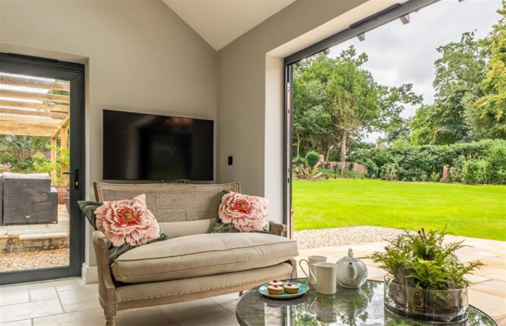 With sliding doors to the garden (photo 2) at The Farmhouse, Nether Hall Estate, Pakenham