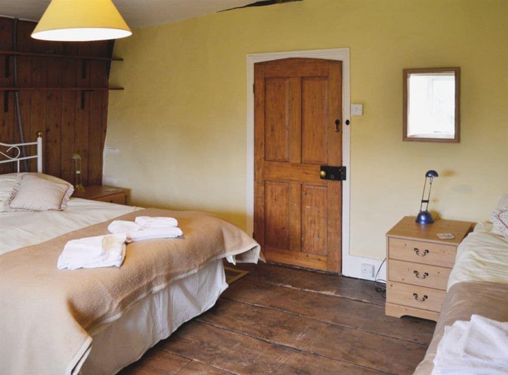 Triple bedroom at The Farmhouse in Newent, Gloucestershire