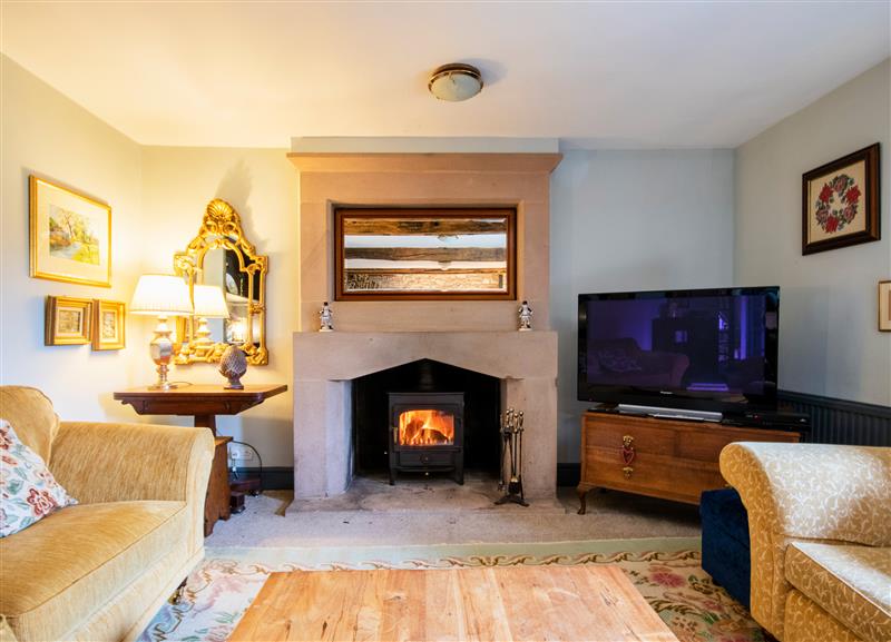 Relax in the living area at The Farmhouse, Over Haddon near Bakewell