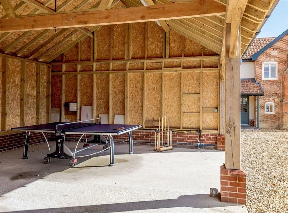 Outdoor table tennis enclosure at The Farmhouse in Tivetshall St. Margaret, Norwich, Norfolk