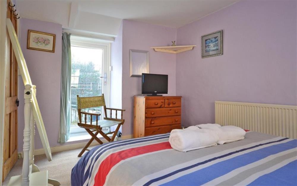 The double bedroom with the little balcony, at The Fellery in Looe