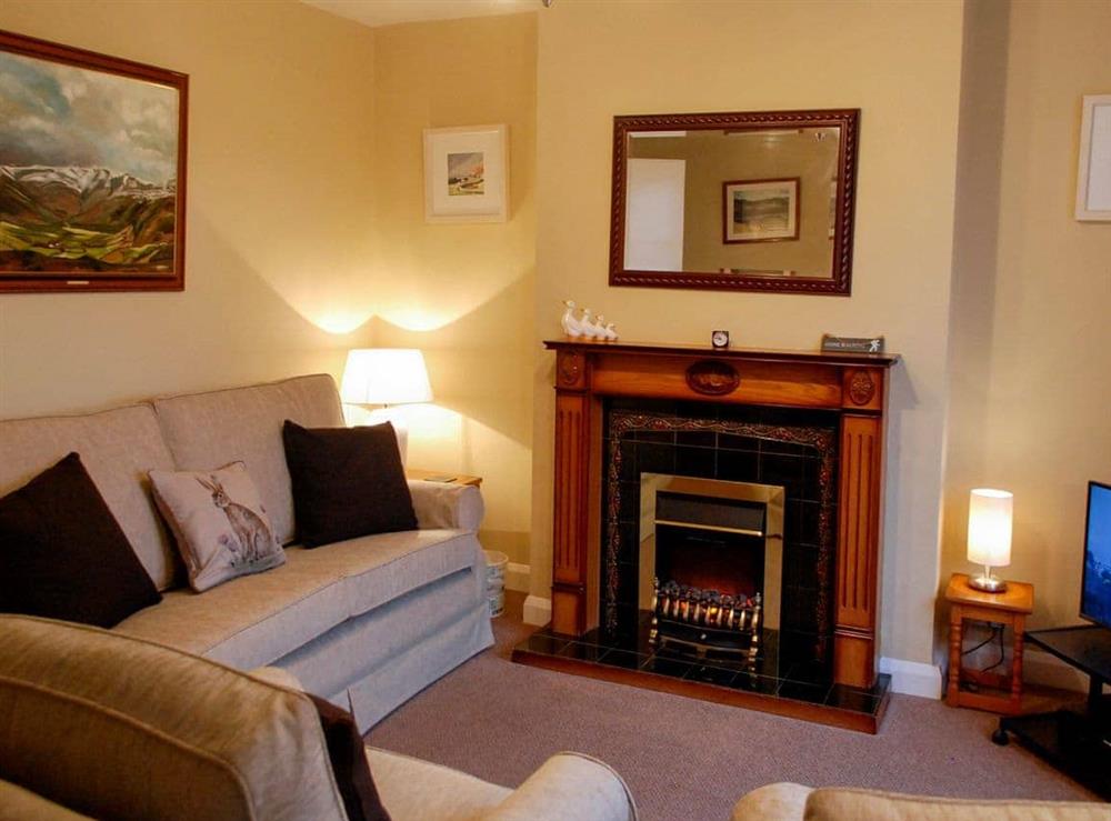 Feature fireplace in charming lounge at The Fells in Maryport, Cumbria