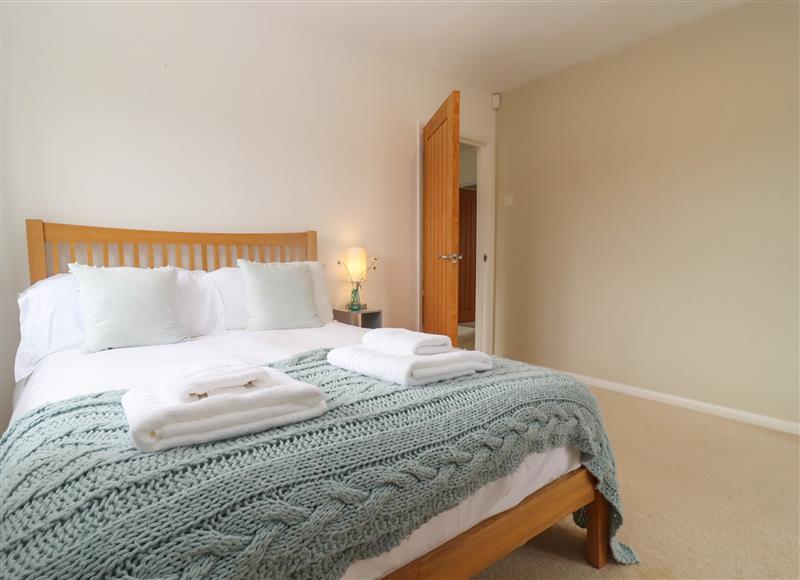 This is a bedroom at The Firs Retreat, Bentham near Brockworth