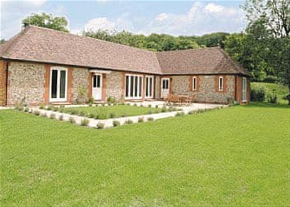 Attractive, detached, single-storey holiday cottage at The Fishing Lodge in Netton, near Salisbury, Wiltshire