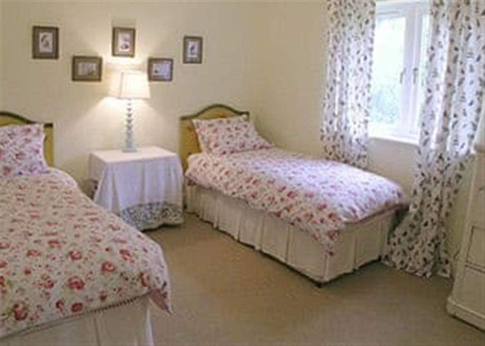 Comfortable twin bedroom at The Fishing Lodge in Netton, near Salisbury, Wiltshire