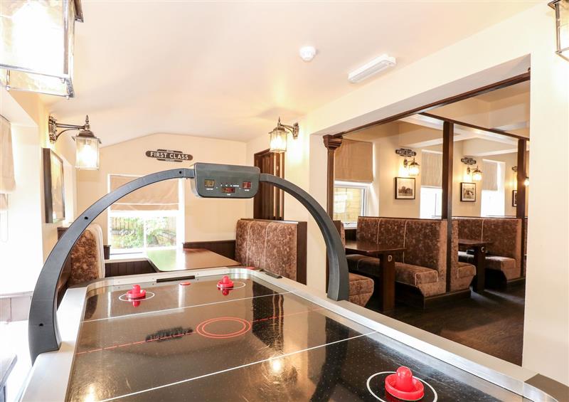 Relax in the living area at The Five Bells Inn, Upwell