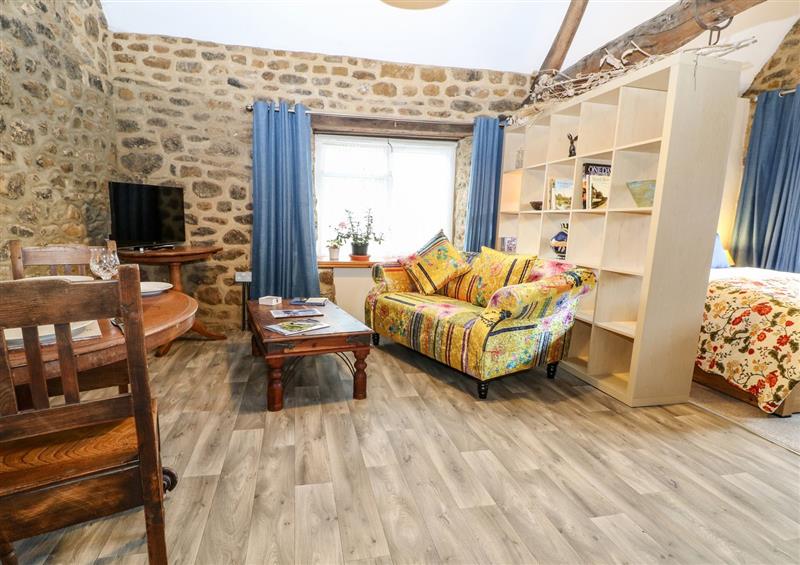 Enjoy the living room at The Forge at Smithy Cottage, Milcombe
