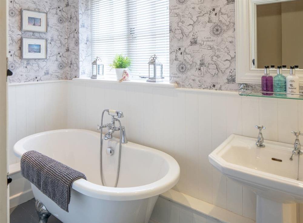 Bathroom with standalone roll top bath at The Forge in Bettiscombe, Nr Lyme Regis, Dorset., Great Britain