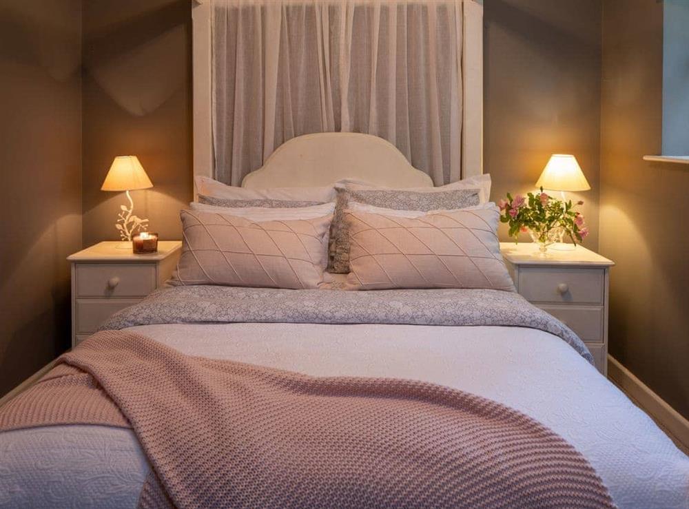 Romantic four poster bed at The Forge in Bettiscombe, Nr Lyme Regis, Dorset., Great Britain