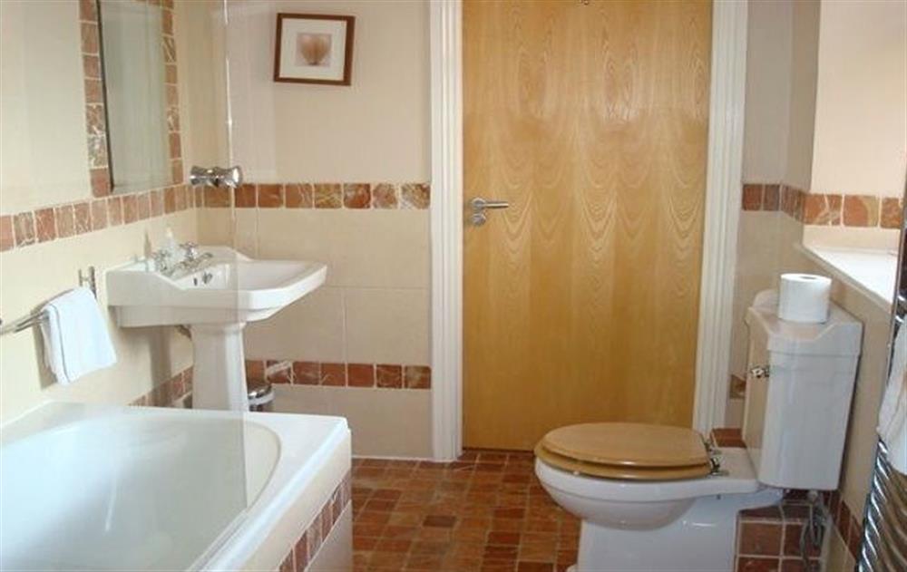 First floor:  Jack and Jill bathroom with bath and shower over giving access to both bedrooms at The Forge, Navan