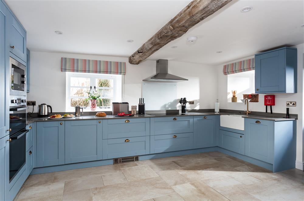 Kitchen with exposed beams at The Gables, Honeybourne