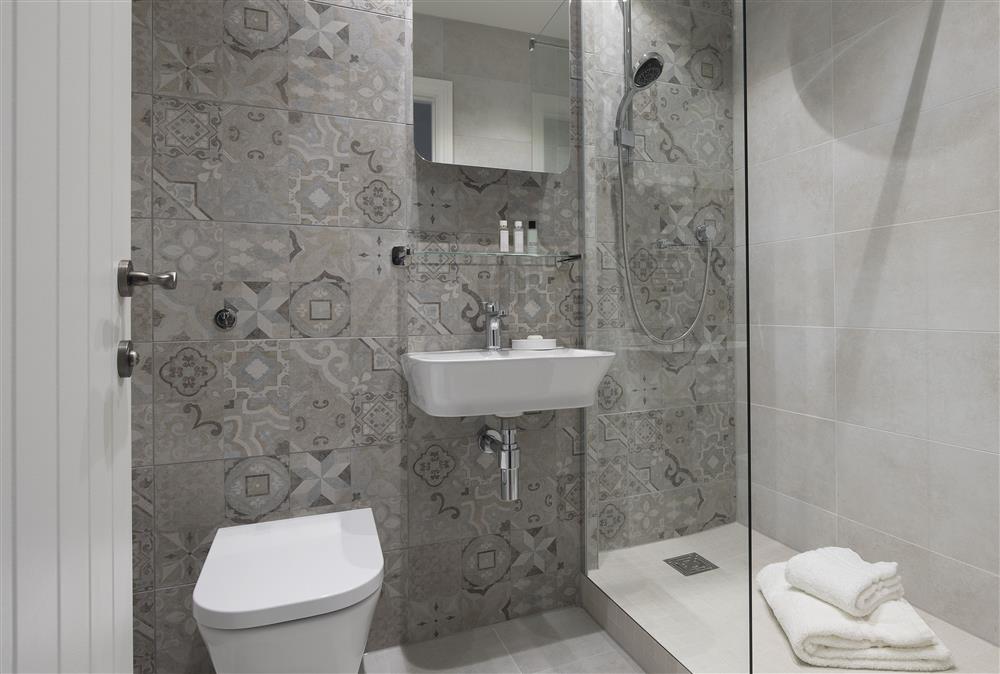 First floor: Stylish family shower room with walk-in shower, wash basin and WC at The Gap, Blockley