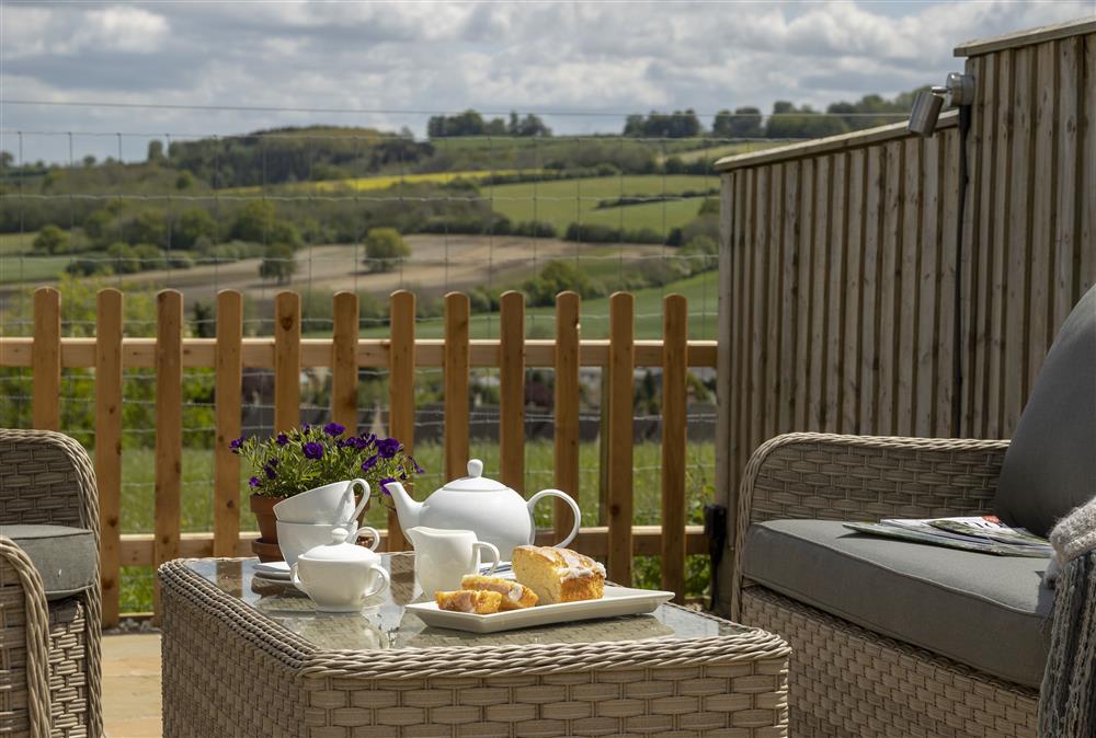 Relax and unwind on the lower terrace in the garden at The Gap, Blockley
