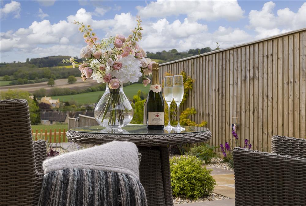 Relax and unwind on the pretty terrace and take in the countryside vista