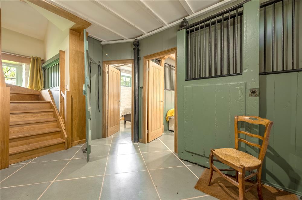Entrance hallway/boot room and stairs leading to bedroom one at The Garden Barn, Peterchurch