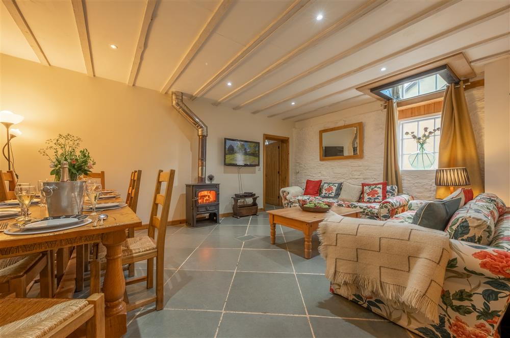 Open-plan living and dining area at The Garden Barn, Peterchurch