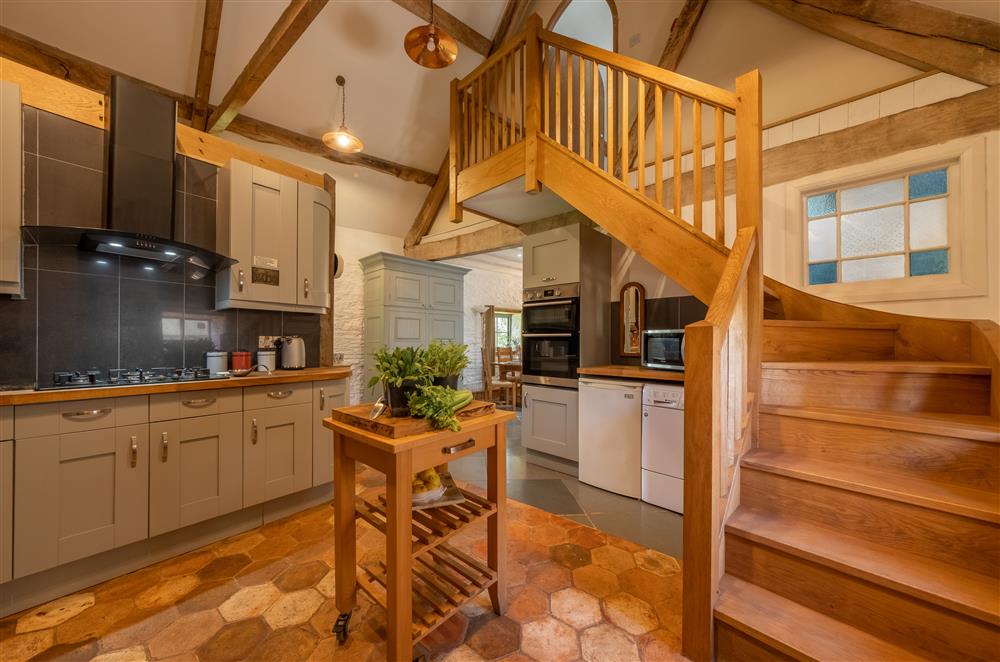 Stairs leading from the kitchen to bedroom two at The Garden Barn, Peterchurch