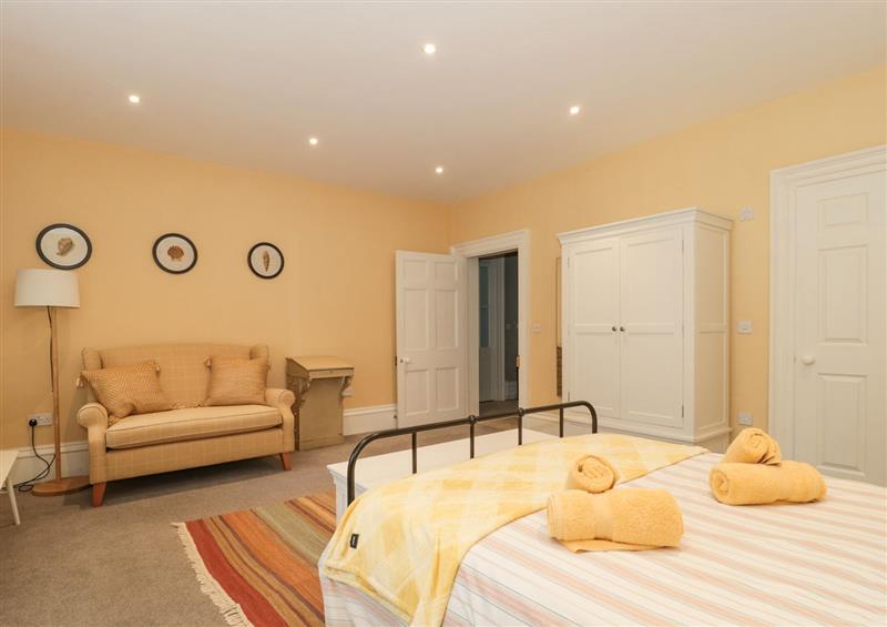One of the 2 bedrooms at The Garden Flat, Charmouth