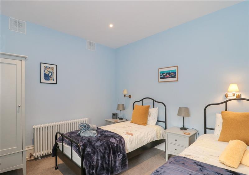 This is a bedroom (photo 2) at The Garden Flat, Charmouth