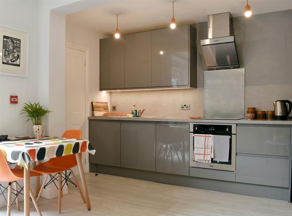 Well equipped kitchen/ dining area at The Garden Flat in St Leonards-on-Sea, East Sussex