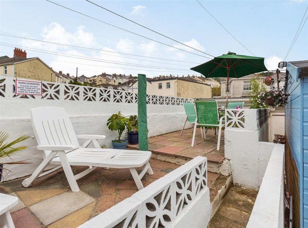 Sitting-out-area (photo 2) at The Garden Flat in Torquay, Devon