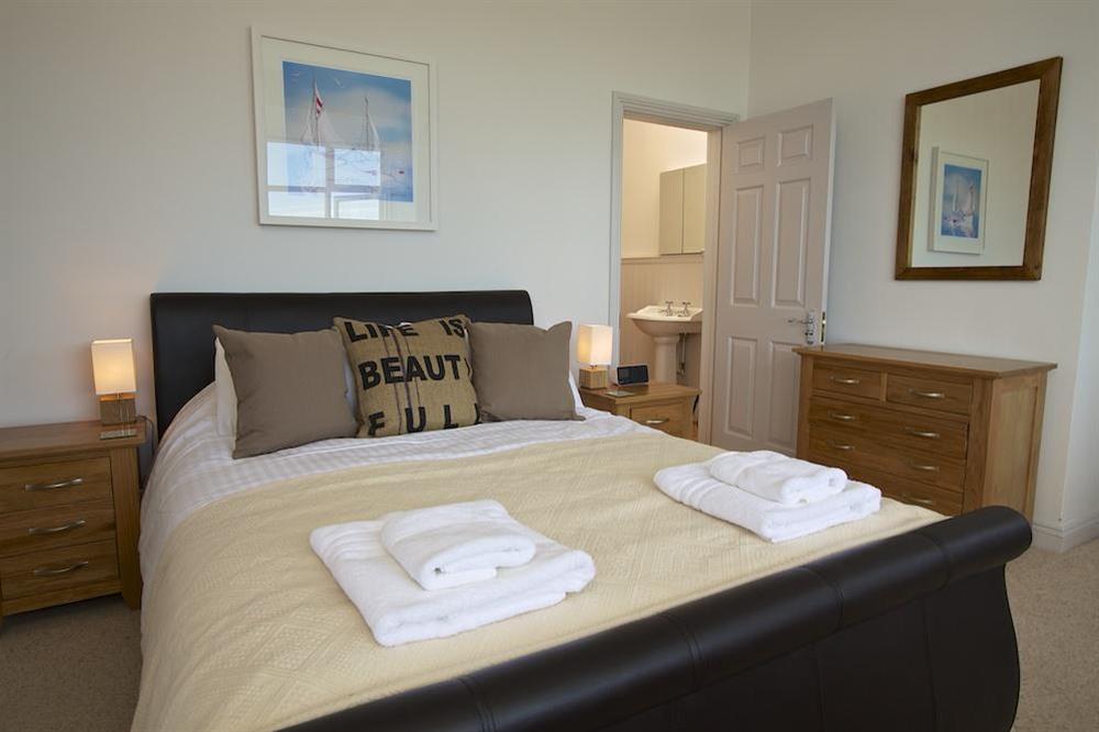 Master bedroom suite with sofa and stunning views (photo 2) at The Garden House (Woodside) in , Salcombe
