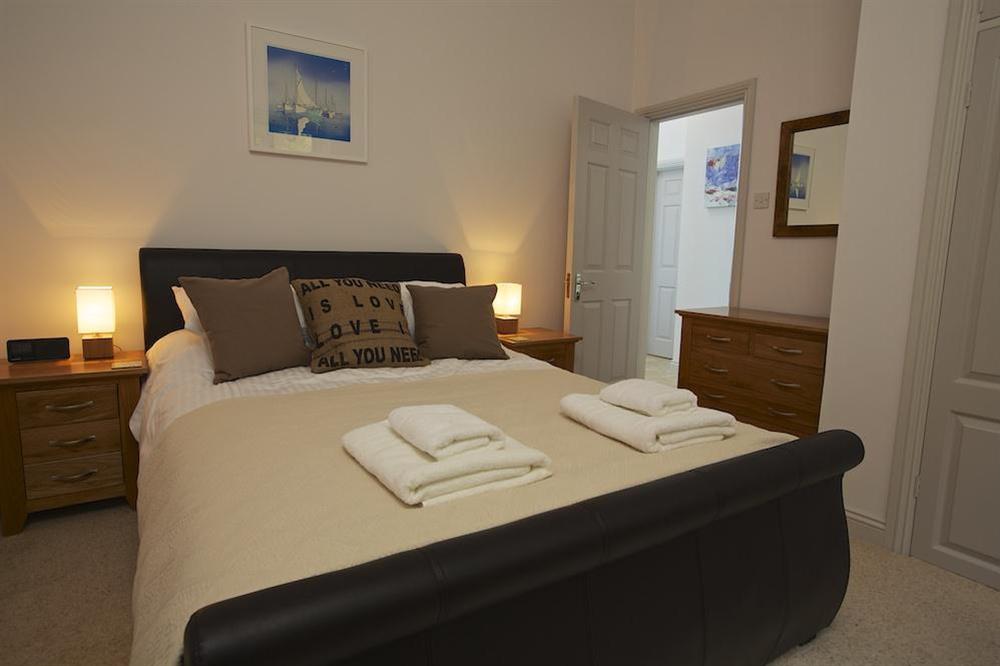 Second double bedroom with King-size leather bed at The Garden House (Woodside) in , Salcombe