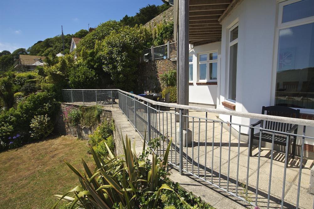 Spacious terrace with tables, chairs and lovely views (photo 3) at The Garden House (Woodside) in , Salcombe
