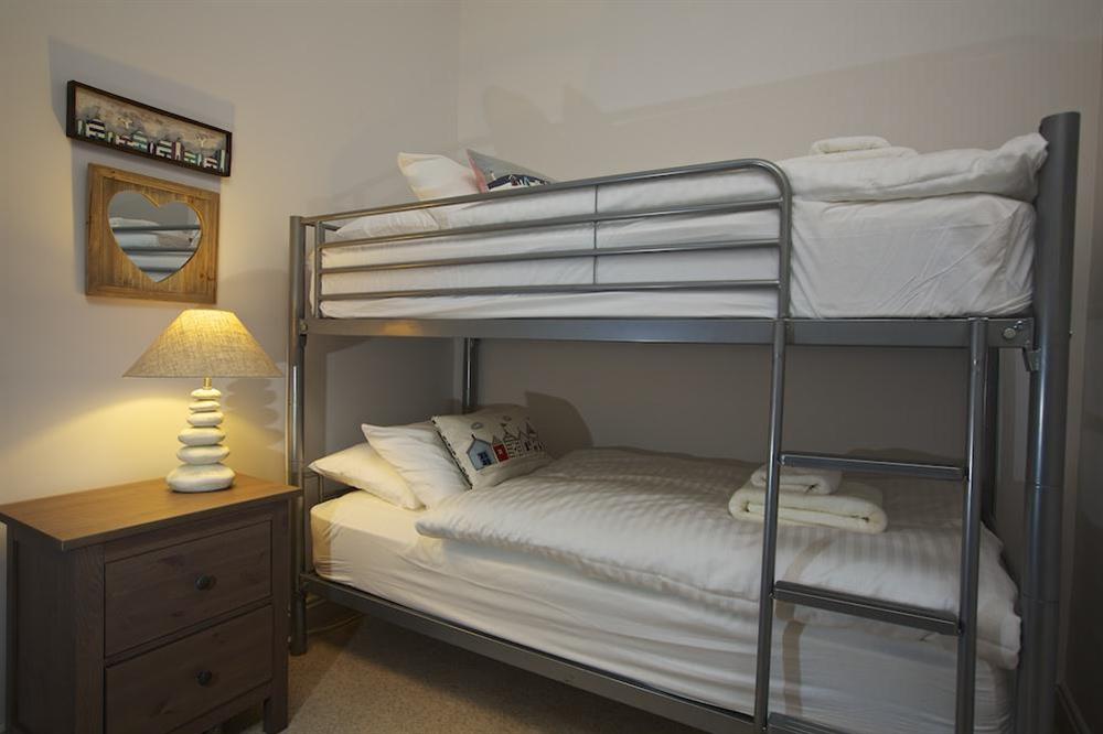 Third bedroom with bunk beds, TV and DVD at The Garden House (Woodside) in , Salcombe