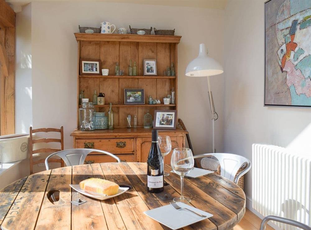 Charming dining area at The Garden Retreat in Marbury, near Whitchurch, Hampshire