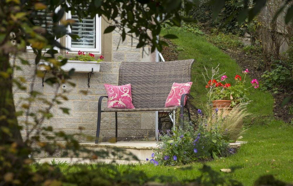 Guests have access to a private patio and garden (photo 2) at The Garden Studio, Bournes Green