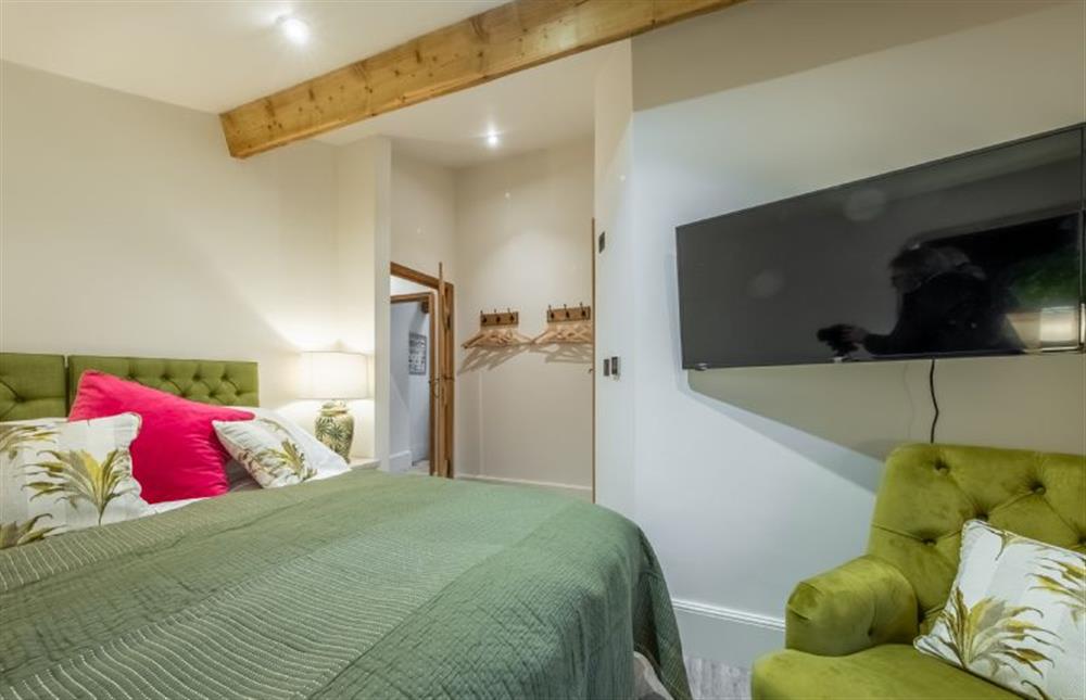Ground floor: Bedroom two with Smart television at The Gardeners Cottage, Earsham near Bungay