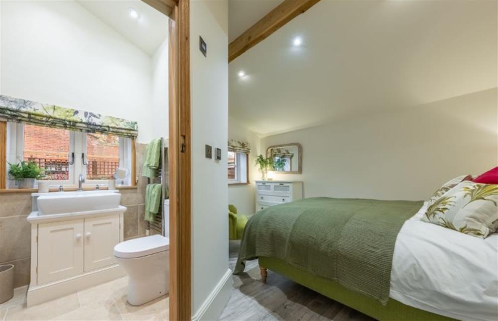Ground floor: En-suite with large walk-in shower, wash basin, WC and heated hand rail at The Gardeners Cottage, Earsham near Bungay