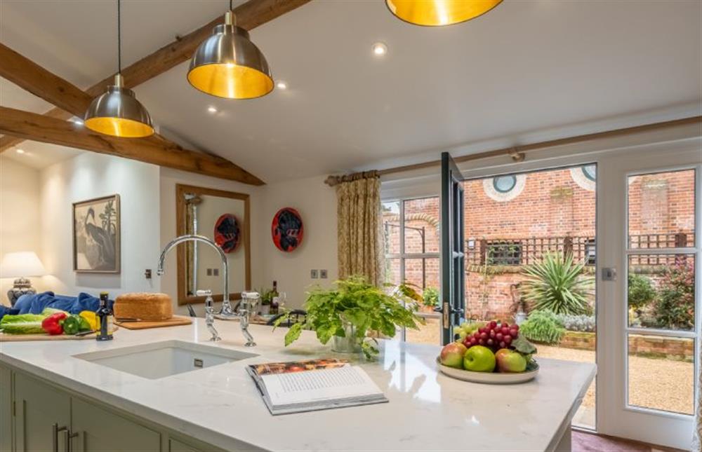 Ground floor: From kitchen out to courtyard at The Gardeners Cottage, Earsham near Bungay