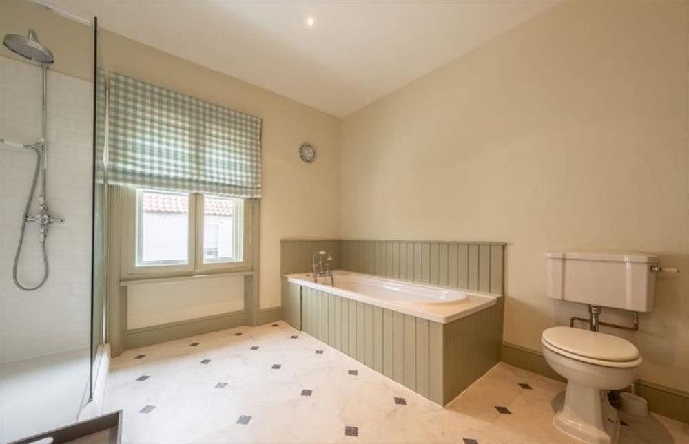 Bathroom two has a bath and shower cubicle at The Gardens, Burnham Market near Kings Lynn