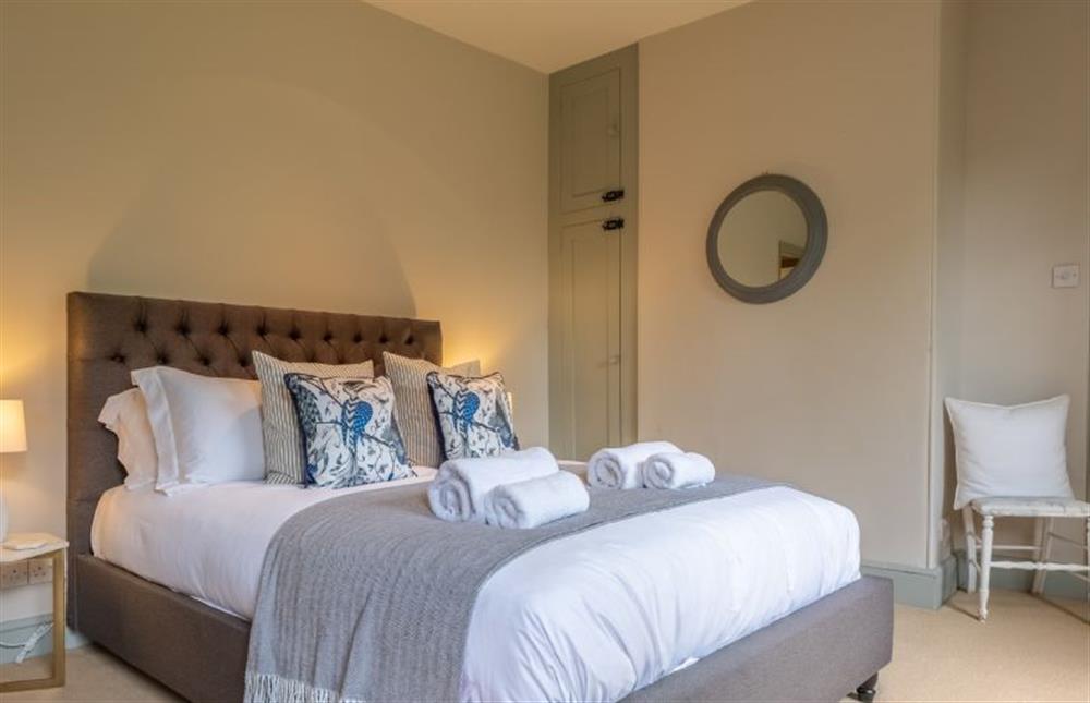 Master bedroom with 5’ king-size bed at The Gardens, Burnham Market near Kings Lynn