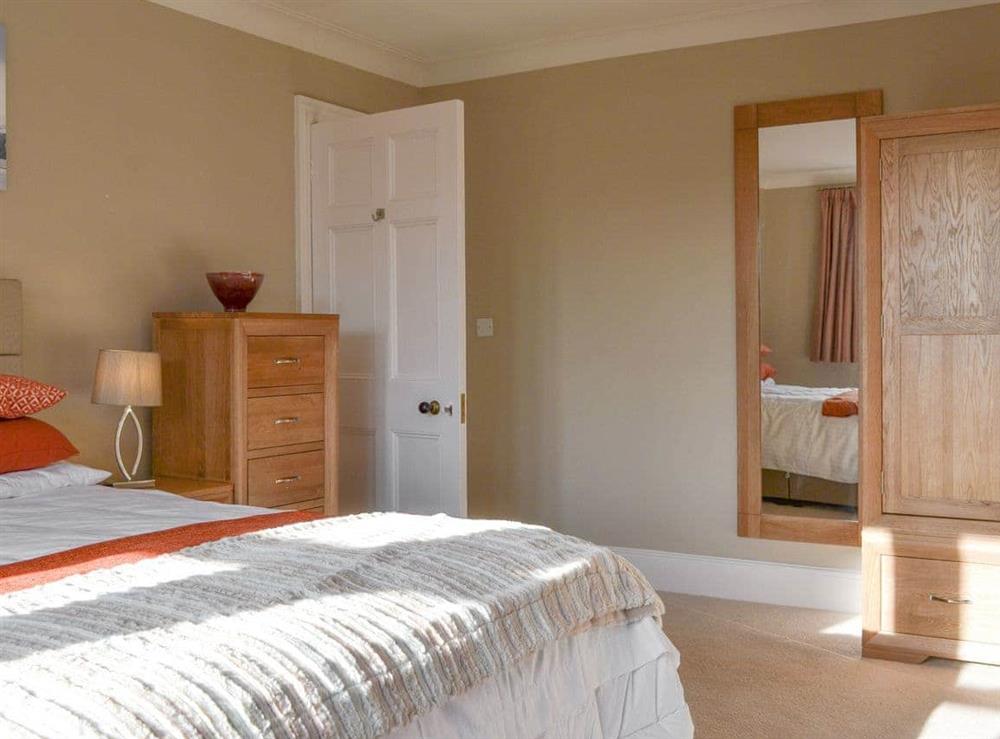 Stylish master bedroom at The Garth in Penrith, Cumbria