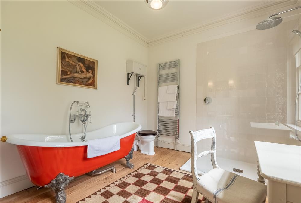 Jack n Jill bathroom with cast iron bath, walk-in shower, Burlington wash basin and WC at The Gate House, Aylsham near Norwich