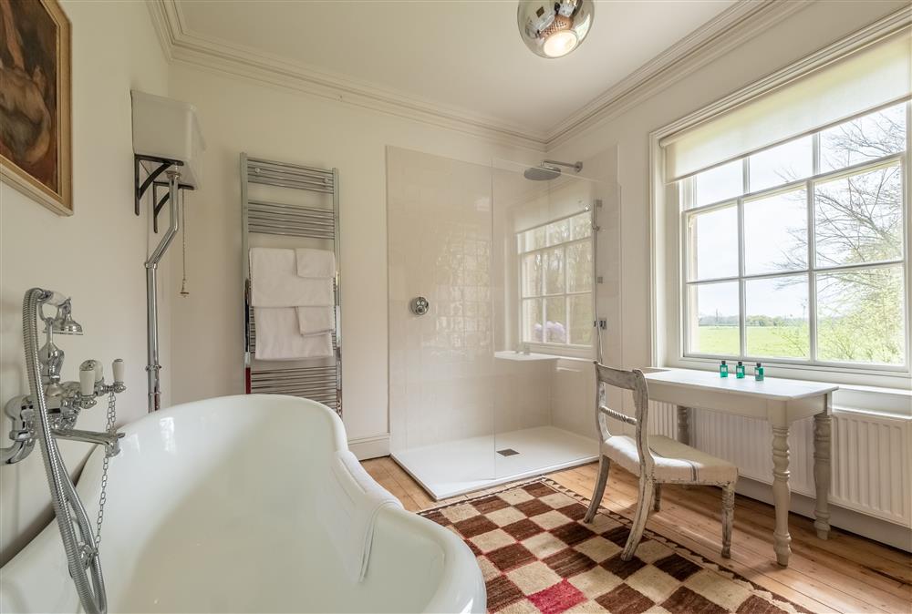 Jack n Jill bathroom enjoys views of the surrounding parkland at The Gate House, Blickling near Norwich