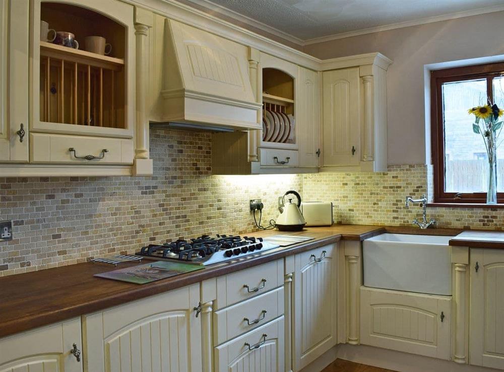 Good size kitchen with breakfast bar at The Gate House in Markinch, near Glenrothes, Fife