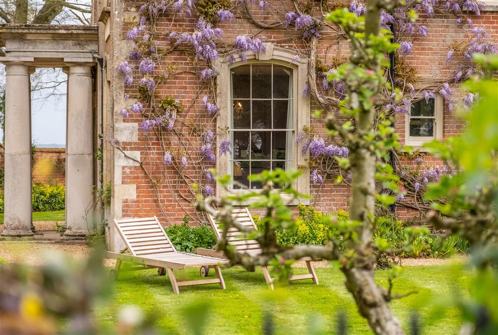Enjoy the views while relaxing in the garden at The Gate House, Wolterton