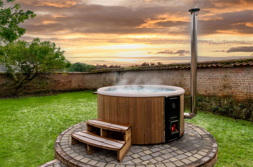 The soothing wood-fired hot tub at The Gate House, Wolterton