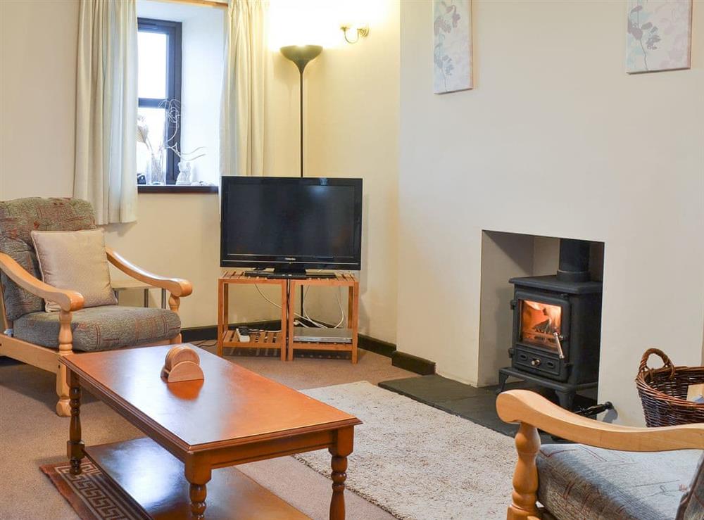 Warm and welcoming living room at The Gatehouse in Aberffraw, Anglesey, Gwynedd