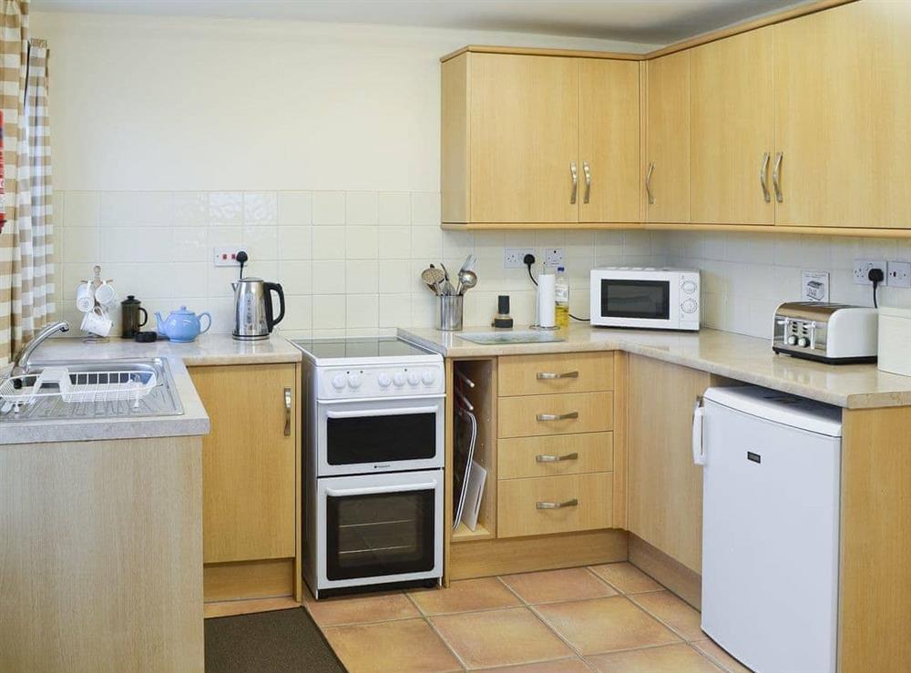 Well-appointed kitchen at The Gatehouse in Aberffraw, Anglesey, Gwynedd